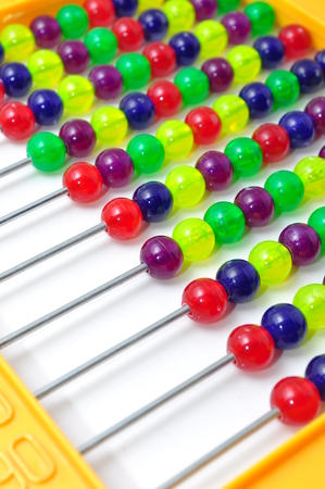 Bright colorful abacus on white の写真素材