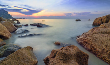 Beauty landscape with sun rising over seaの写真素材