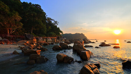 Beauty landscape with sun rising over seaの写真素材