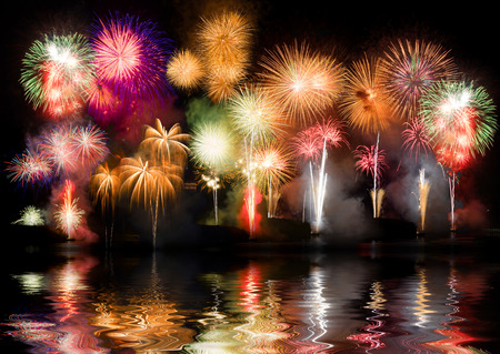 Colorful fireworks. Fireworks are a class of explosive pyrotechnic devices used for aesthetic and...