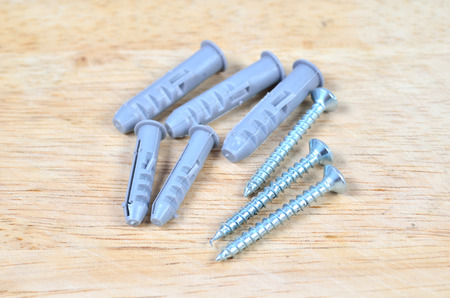 Screws and plastic anchor (wall plugs)
