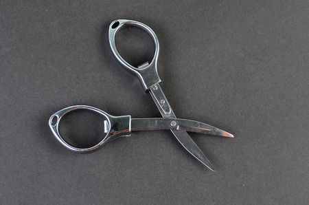Metal Scissor with black backgroundの写真素材