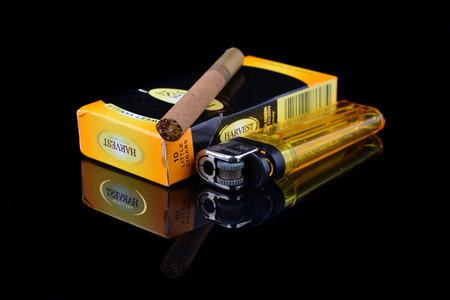 MELAKA, MALAYSIA - FEBRUARY 27, 2016 - A box of HARVEST Cigar with sweet Vanilla flavor made from Germany isolated on black backgroundのeditorial素材