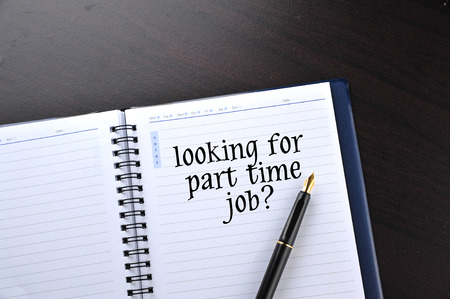 Notebook with fountain pen written word looking for part time jobの写真素材