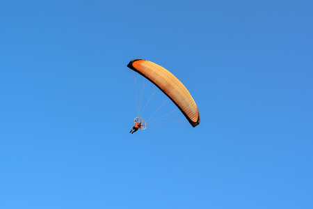 Paragliding in the skyの写真素材