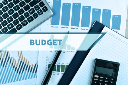 Notebook and Laptop with graph and charts. Financial Concept with word Budgetの写真素材