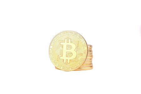 Golden Bitcoins isolated on white background. Cryptocurrencyの写真素材