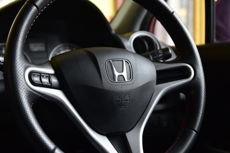 MELAKA, January 6, 2018 : View of HONDA steering and meter. Focus on HONDA logo. A crop close up steering wheelsのeditorial素材