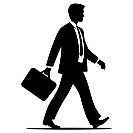 Silhouette of a businessman walking with a briefcase on a white backgroundのイラスト素材
