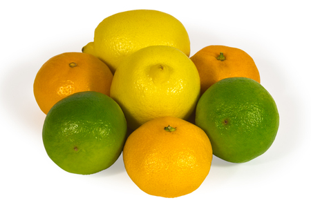 fresh limes, lemons and tangerins isolated on white.の写真素材