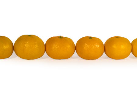 fresh orange tangerines isolated on whiteの写真素材