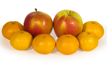 fresh apples and orange tangerines isolated on white,の写真素材