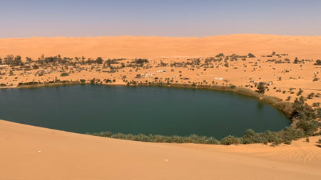 sand dunes and lakeの写真素材