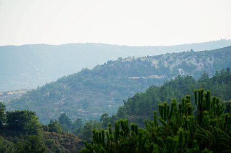 Beautiful view of the mountains and houses on a sunny day, Cyprusの写真素材