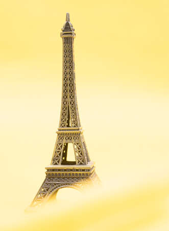 Eiffel Tower, Paris, France. Isolated in yellow background