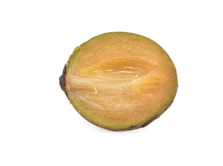 Ripe Sapodilla fruit isolated on the white background.