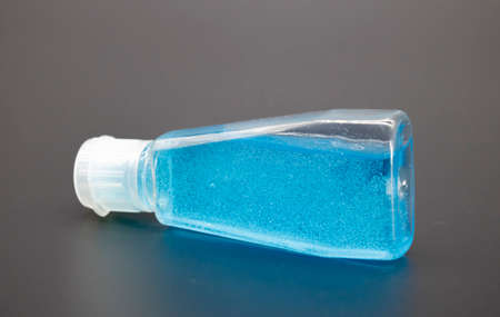 hand sanitizer bottle close up isolate on black background