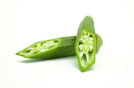 fresh okra sliced isolated on the white background