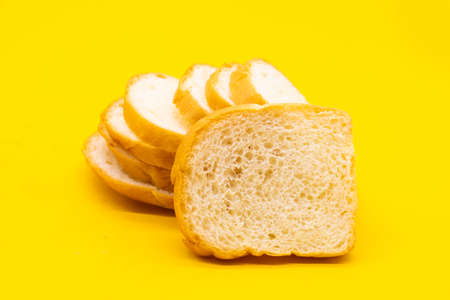 sweet bread isolated on yellow backgroundの写真素材