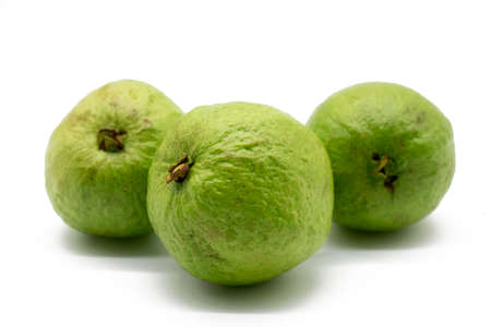 green Guava or peyara fruit isolated on the white background.
