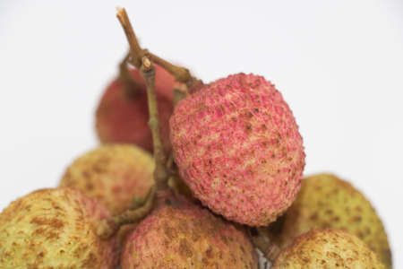 group of lychee in selective focus over on white backgroundの写真素材