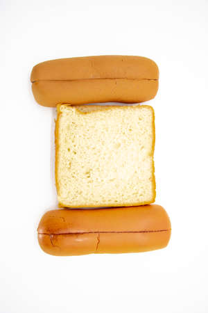 two types whole bread isolated on white backgroundの写真素材