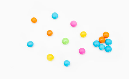 Tasty colorful candies design on white background, top viewの写真素材