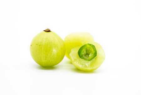 gooseberry fruits or Amalaki slice isolated on white background. macroの写真素材