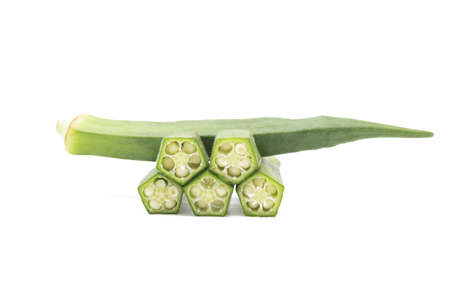 okra or bhendi pieces over on white backgroundの写真素材