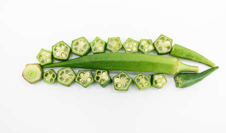 fresh slices and whole of okra or Lady Finger isolate on white background, top viewの写真素材