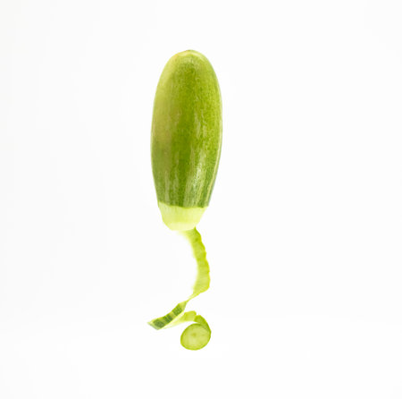 skin slice Pointed gourds vertically isolated on white backgroundの写真素材