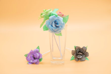 paper made rose isolate on low light backgroundの写真素材