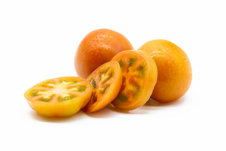 Tomatoes slices isolated on white background.の写真素材