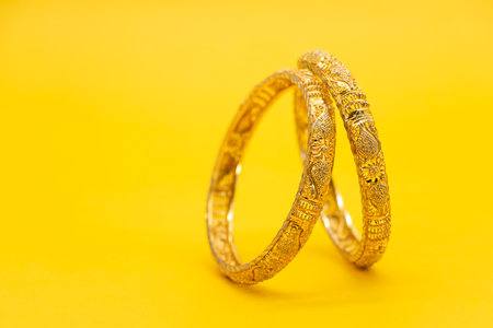 jewelry bracelet for women isolated on yellow backgroundの写真素材