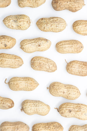 Useful peanut, close-up, isolated on white background.の写真素材