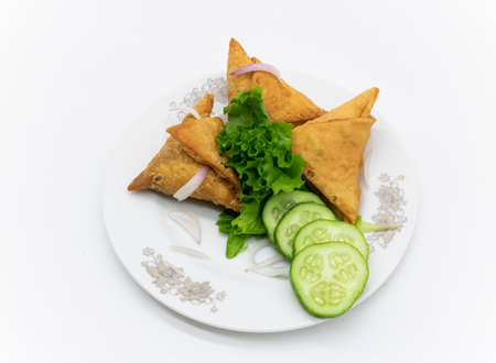 deep fry Vegetable Samosa with chili isolated on white background,