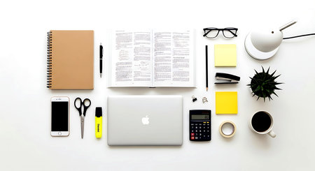 Top view of modern office desk table with laptop, smartphone, stationery and coffee cupの素材