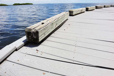 Dock located in Biscayne National Park in Homestead, Florida, Dock and blue ocean water.の写真素材