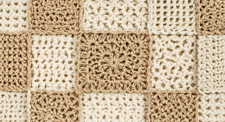 Knitted wool texture background. Close up of beige knitted texture.