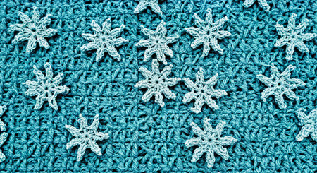 Blue knitted background with snowflakes. Close-up.の写真素材