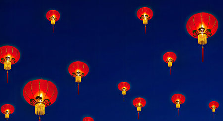 Chinese New Year lanterns on a dark blue background with space for text
