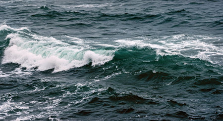 blue sea with waves and foam, natural background, close-upの写真素材
