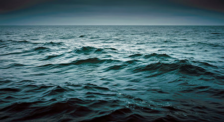 Blue sea with waves and sky. Nature background. Toned.