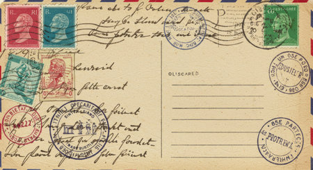 Old postcard with stamps from the United States of America and Canadaの写真素材