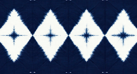 Seamless tie-dye pattern of indigo color on white silk. Hand painting fabrics - nodular batik. Shibori dyeing.の写真素材