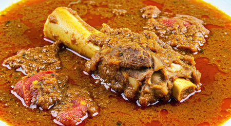 A close up shot of a bowl of spicy beef goulash