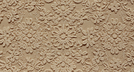 Closeup detail of beige lace fabric texture background with copy space