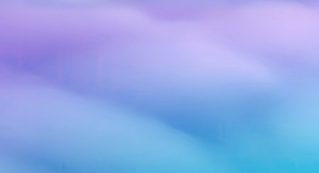Create a dreamy atmosphere with this ethereal abstract background perfect for calming creative design projects now. A soft fog like gradient smoothly blends gentle lavender purple and cool blue hues evoking a sense of calm mystery.の写真素材