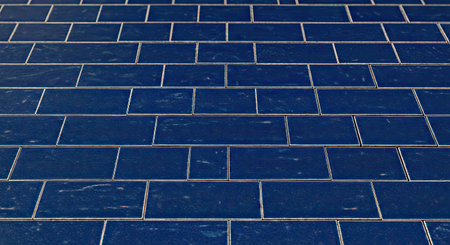 A clean blue tiled texture background featuring a flawless seamless arrangement. This provides a...