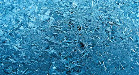 Detailed Frosty Glass Surface Texture Background with Blue Hue